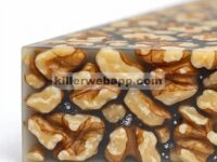 Efek Sinergis terhadap Sifat Mekanik, Termal, dan Morfologi Komposit HDPE yang Diperkuat dengan Kulit Kenari dan Nano-Kalsium Karbonat